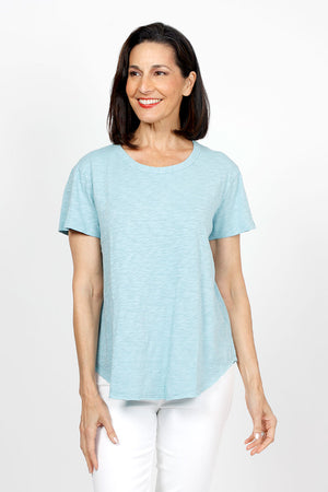 Mododoc Crew Neck High/Low Tee in aqua. Crew neck tee with short sleeves. Curved high low hem. Relaxed fit._35118795292872