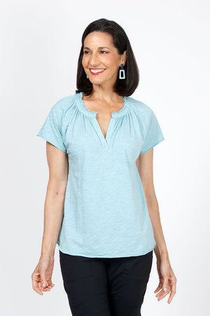 Mododoc Ruffle Henley Swing Tee in Aqua Dreams.  Crew neck with open v placket.  Raglan short sleeve.  Ruffle at neck.  Swing shape.  Raw edges.  Relaxed fit._35299707125960