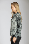 APNY Paint Swirls Blouse in Black and Ivory. Scribble pattern with reverse color blocked construction. Pointed collar button down with long sleeves with button cuffs. High low shirt tail hem. Relaxed fit._t_34490907295944