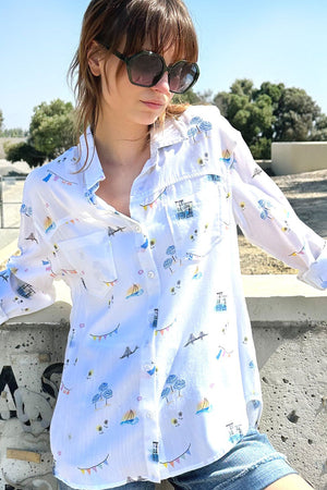 Billy T Vacation Shirt in White with French inspired miniature print.  Pointed collar button down with dropped shoulder.  Long sleeves with button cuff and roll button tabs.  Front and back yoke.  Shirt tail  high/low hem.  Relaxed fit._34331152351432