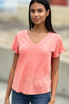 Billy T Ruffle V Neck Tee in Citrus, a light orange.  V neck slub tee with short ruffle hem sleeve.  High low curved hem.  Raw edges.  Relaxed fit._t_34304994279624