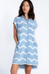Billy T Lila Shirt Dress in Denim with White Chevron print.  Pointed collar buttondown shirt dress with 2 front patch pockets at breast and 2 slash pockets.  Short cap sleeve.  Fringed hem.  High low hem.  Relaxed fit._t_34273390461128