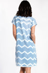 Billy T Lila Shirt Dress in Denim with White Chevron print. Pointed collar buttondown shirt dress with 2 front patch pockets at breast and 2 slash pockets. Short cap sleeve. Fringed hem. High low hem. Relaxed fit._t_34273390493896