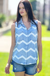 Billy T Myra Shirt in Denim with white chevron print. Sleeveless button down shirt with pointed collar.  2 front breast patch pockets.  Center back placket with inverted pleat below.  Shirt tail hem.  Relaxed fit._t_34273372700872