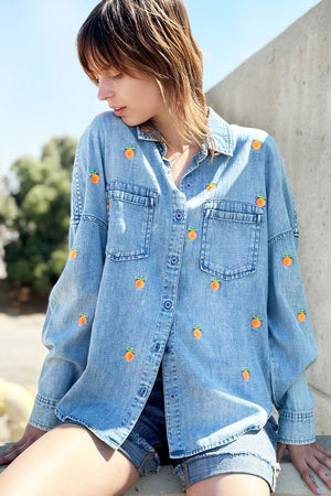 Billy T Citrus Embroidered Shirt in Denim.  Refined denim shirt with embroidered oranges, on front back and sleeves.  Pointed collar button down with long sleeves and button cuff.  2 front patch pockets.  Back yoke.  Dropped shoulder.  Relaxed fit._34331151040712