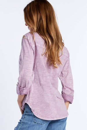 Billy T Fine Henley Top in Purple. Acid wash split v neck henley with 4 button placket. Long sleeves with roll tab closure. Shirt tail hem. Relaxed fit._34406233571528