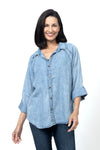 Billy T The Good Shirt in Denim.  Pointed collar button down soft denim shirt.  Raglan seam with doubled seam detail.  Long sleeve with button cuff and roll tab closure.  High low shirt tail hem.  Relaxed fit._t_34518592094408