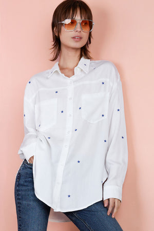 Billy T VIP Star Shirt in white with blue embroidered stars.  Pointed collar button down shirt with long sleeves with button cuffs.  Front and back yoke.  2 front patch pockets.  Shirt tail hem.  Relaxed fit._34938742407368