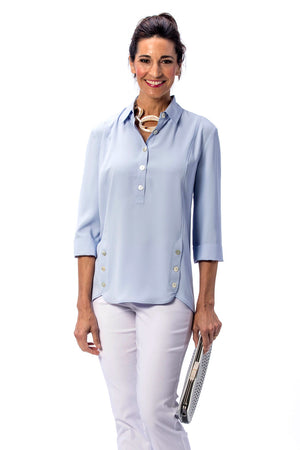 Beau Chemise Tulip Hem Blouse in Sky Blue. Pointed collar popover with 4 button placket. Tulip hem in front with 3 button trim on each side. 3/4 sleeve. Relaxed fit_34580222247112