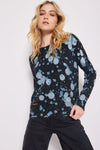 Lisa Todd Cosmic Crush Sweater in Black.  Abstract dot print in shades of blue on a black background.  Crew neck long sleeve sweater with rib trim at neck, hem and cuffs.  Hand stitch details.  Distressed edges at cuff and hem.  Classic fit._t_34618749485256