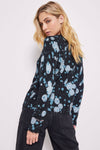 Lisa Todd Cosmic Crush Sweater in Black. Abstract dot print in shades of blue on a black background. Crew neck long sleeve sweater with rib trim at neck, hem and cuffs. Hand stitch details. Distressed edges at cuff and hem. Classic fit._t_34618749419720