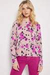 Lisa Todd Cosmic Crush Sweater in Primrose. Abstract dot print in shades of hot pink and black on a pink background.. Crew neck long sleeve sweater with rib trim at neck, hem and cuffs. Hand stitch details. Distressed edges at cuff and hem. Classic fit._t_34618749386952