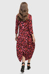 Alembika Begonia Cocoon Dress. Pink and red petal print on a black background. V neck midi dress with a high neck in back. 3/4 sleeve Dropped waist. Bubble skirt. 2 in seam pockets. Relaxed fit._t_34703985574088