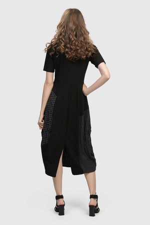 Alembika Hera T Shirt Cocoon Dress in Black. Short sleeve crew neck dress with contour seams. Bubble skirt with patchwork of plaids and stripes. Relaxed fit._35088773316808