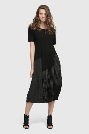 Alembika Hera T Shirt Cocoon Dress in Black.  Short sleeve crew neck dress with contour seams.  Bubble skirt with patchwork of plaids and stripes.  Relaxed fit._35088773284040