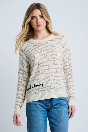Lisa Todd Normal is Boring Cashmere Sweater in Winter White.  Crew neck long sleeve sweater with screen print "normal is boring" slogan throughout.  Embroidered slogan in black at lower right.  Rib trim at neck, hem and cuff.  Classic fit._61210145554798