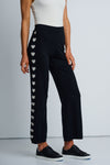 Lisa Todd Heart Track Pant in Black.  1 1/4" elastic waist pull on cotton/cashmere pant.  Gray intarsia hearts down the side of each leg.  Straight leg.  Snug through stomach and hip, straight to hem. Rib trim at hem.  10 1/4" leg opening; 28" inseam._t_61429932949870