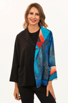 Lemon Grass Reversible Crepe Jacket in Turquoise. Turquoise and black print on the right side of front with solid black on the left. Reverses to a different print on the left side and solid black on the right._t_34446939259080