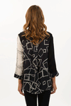 Lemon Grass Mixed Media Blouse in Black/White. Mixed prints . Stand collar button down jacket with 3/4 sleeve with split cuff. High low hem. 2 front slant welt pockets. Relaxed fit._t_34547482165448