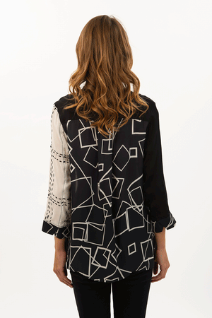 Lemon Grass Mixed Media Blouse in Black/White. Mixed prints . Stand collar button down jacket with 3/4 sleeve with split cuff. High low hem. 2 front slant welt pockets. Relaxed fit._34547482165448