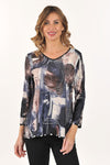 Lemon Grass Reversible V Neck Top in Safari.  Abstract print reverses to polka dot print.  Banded v neck and hem.  3/4 sleeve with banded trim.  A line shape.  Relaxed fit._t_61200472605038