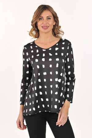 Lemon Grass Reversible V Neck Top in Safari.  Abstract print reverses to polka dot print.  Banded v neck and hem.  3/4 sleeve with banded trim.  A line shape.  Relaxed fit._61200472637806