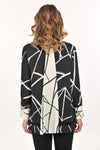 Lemon Grass Stand Collar Eyelet Trim Blouse in Black/Cream.  Black and cream abstract line print with reverse color trim.  Stand collar button down blouse with pairs of buttons.  Long sleeves with double button cuff.  Reverse print inset down center back.  Eyelet ribbon detail.  High low hem.  Side slits.  Relaxed fit._t_61407833653614