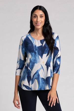 Sympli Go To Classic Relax Print Top in Watery Reflections. Shades of blue with and white abstract print.Modified crew neck 3/4 sleeve relaxed top with curved hem. Side slits. Relaxed fit_34817885929672