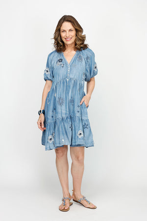 Kyla Seo Amina Dress in Blue.  Distressed denim wash.  V neck dress with 4 button placket.  Tiered from below bust with gathers.  Short gathered sleeves.  A line, relaxed fit.  _60951620583790