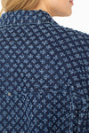 Liverpool Easy Crop Trucker Jacket in Laser Pinhole. Dark denim with laser pinhole flocked pattern.  Pointed collar button down jacket with metal buttons.  2 front patch flap pockets with buttons.  Dropped shoulder 3/4 sleeve jacket.  Contour seams.  Banded bottoms.  Boxy fit._t_61400754553198