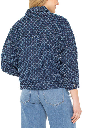 Liverpool Easy Crop Trucker Jacket in Laser Pinhole. Dark denim with laser pinhole flocked pattern.  Pointed collar button down jacket with metal buttons.  2 front patch flap pockets with buttons.  Dropped shoulder 3/4 sleeve jacket.  Contour seams.  Banded bottoms.  Boxy fit._61400754585966