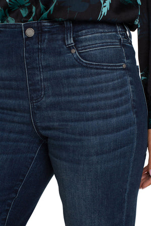 Liverpool Gia Glider Slim Jean in Warner Lake, a dark blue wash.  Pull on jean with inset elastic waistband with faux zipper placket.  Funtional 5 pocket jean styling.  Slim leg.  Inseam: 29"_61394263605614