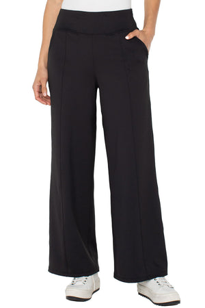 Liverpool Wide Leg Tech Pant in Black.  Drop waist pull on athleisure pant.  2 front slash pockets.  Wide leg.  Center front leg seams.  Shaped seams in back.  28" inseam._61403500806510