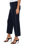 Liverpool Cargo Crop with Chain Trim in Lunar Blue a dark navy. Wide leg crop pant with button and zip closure. 2 large front pockets with stitch detail. 2 back flap cargo pockets. 26" inseam._t_34626792685768