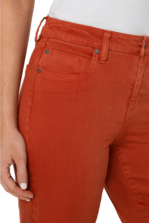 Liverpool Straight Crop Jean in Cinnabar, a rust color. 5 pocket mid rise straight leg jean. 10" rise, 27" inseam._34476609700040