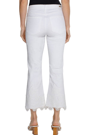 Liverpool Hannah Crop Flare with Lace Hem in White. Mid rise jean with button and zipper closure. Slim to knee with kick flare hem. 5 pocket jean styling. Lace applique trim around hem. 25 1/2" inseam._35054236631240