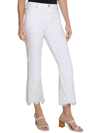 Liverpool Hannah Crop Flare with Lace Hem in White. Mid rise jean with button and zipper closure. Slim to knee with kick flare hem. 5 pocket jean styling. Lace applique trim around hem. 25 1/2" inseam._35054236664008