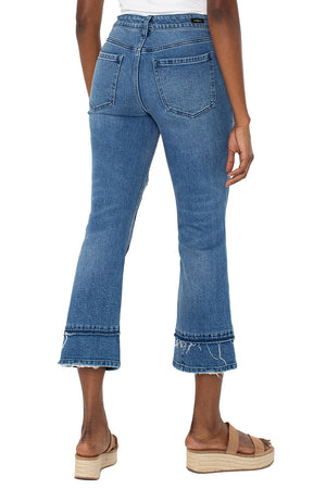 Liverpool Hannah Double Hem Crop Flair in Tremont, a medium blue wash.  Mid rise 5 pocket jean with patchwork detail and a double hem.  Set in waistband with belt loops.  Button and zipper closure.  Flare leg.  25 1/2" inseam._60562164744558