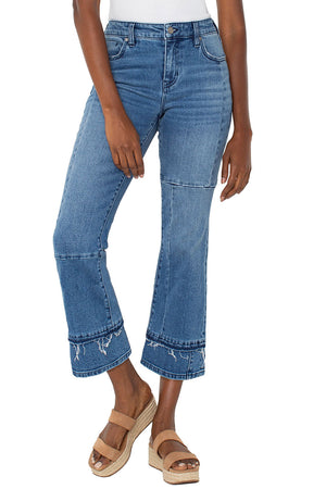 Liverpool Hannah Double Hem Crop Flair in Tremont, a medium blue wash.  Mid rise 5 pocket jean with patchwork detail and a double hem.  Set in waistband with belt loops.  Button and zipper closure.  Flare leg.  25 1/2" inseam._60562164679022