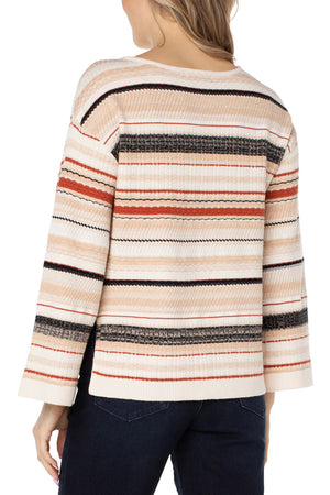 Liverpool Texture Stripe Sweater in shades of camel, rust and black on a cream colored background. Boat neck long sleeve sweater with drop shoulder and textured stitching. Relaxed fit._34400361742536
