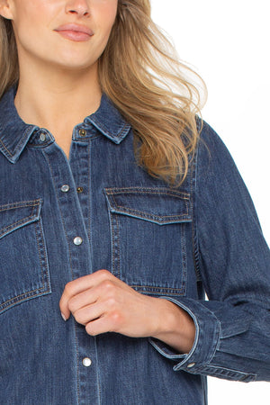Liverpool Denim Snap Front Shirt in Denim.  Pointed collar snap front with faux pearl buttons.  2 front flap pockets.  Long sleeve with snap cuff.  Back yoke.  Relaxed fit._61497807241582