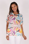 Atelier 5 Scoop Neck Top in Multi Doodle. Abstract multi colored doodle print on a cream background. Short sleeve scoop neck top with a line shape. Fused seams. High low hem. A line shape._t_34245529043144