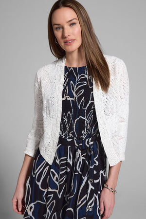 NIC+ZOE Subtle Sequin Cardi in Classic Cream.   Open front knit with scattered small sequins, open weave and stitched motifs.  3/4 sleeve.  Notched v at back neck.  Longer in front than back.  Classic fit._60267266703726
