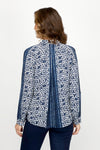 NIC+ZOE Etched Angles Shirt in Indigo Multi.  Batik inspired print.  Pointed collar with notched v button down.  Long sleeves with button cuff and button roll tab.  Contrasting stripe down center of sleeve and at side seams.  Back inverted pleat with stripe interior.  Shirttail hem.  Classic fit._t_60951658922350