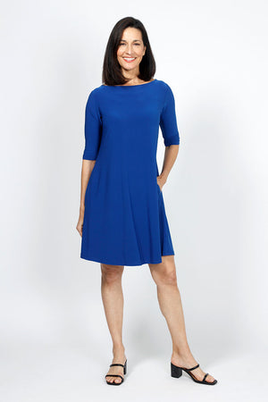Sympli Nu Trapeze Elbow Sleeve Dress in Twilight. Boat neck elbow sleeve a line dress in 2 in seam pockets. Relaxed fit._35033426788552