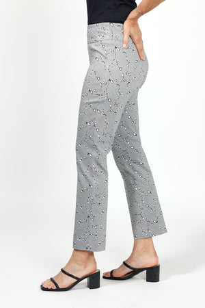 Rafinalla Floral Ankle Pant. White and black small floral and vine print on a black and white background. 3" waistband pull on pant. 28" inseam._35065516622024