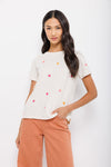 Lisa Todd Strawberry Fields Tee in Bluff. Crew neck short sleeve tee with sewn cuff. Embroidered strawberry appliques on front and sleeves. Plain back. Relaxed fit._t_35431705510088