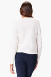 NIC+ZOE Polished Up Sweater in Cream. V neck long sleeve sweater with geometric cut out inset placket around neckline. Rib trim at cuff and hem. Classic fit._t_35077498699976