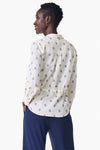 NIC+ZOE Constellation Jacket in Cream with navy miniature print. Pointed collar button down hybrid shirt jacket. Long sleeves with button cuffs. Back yoke. Shirt tail hem. Cinch tie at waist. Relaxed fit._t_35249431806152