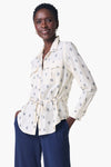 NIC+ZOE Constellation Jacket in Cream with navy miniature print.  Pointed collar button down hybrid shirt jacket.  Long sleeves with button cuffs.  Back yoke.  Shirt tail hem.  Cinch tie at waist.  Relaxed fit._t_35249431838920